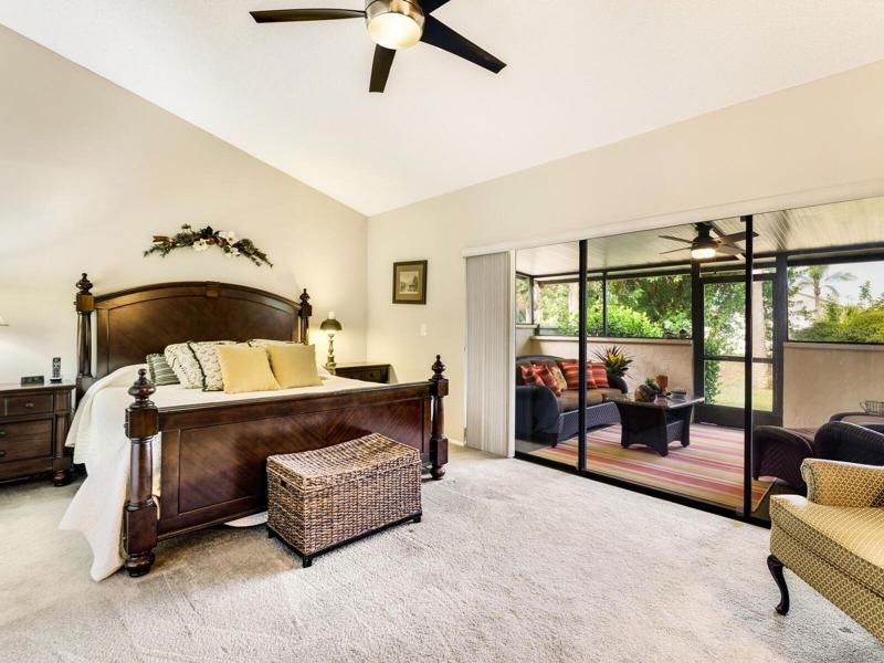 Spacious Master Suite with access to covered Florida-patio room.
