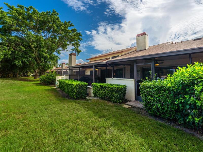 Rear of villa - big sweep of private greenbelt