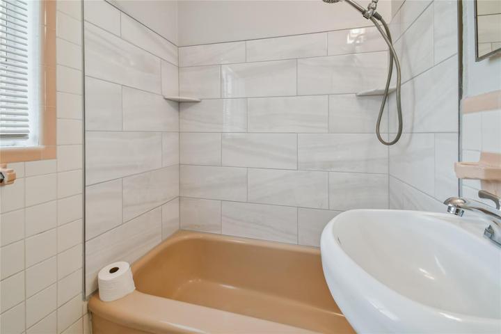 Bathroom with tub shower combo