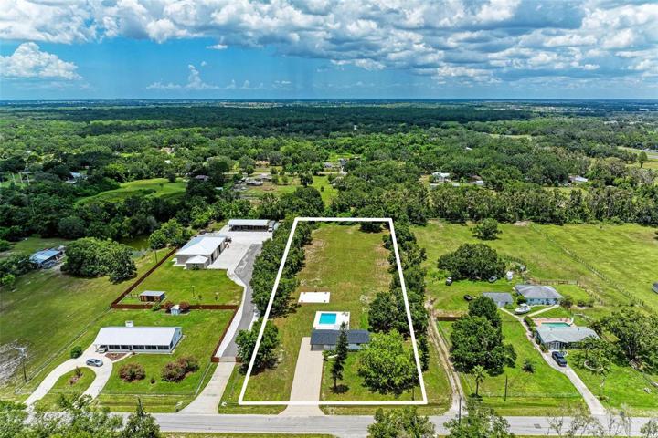 3/2 home with 2.3 acres of land in prime location!