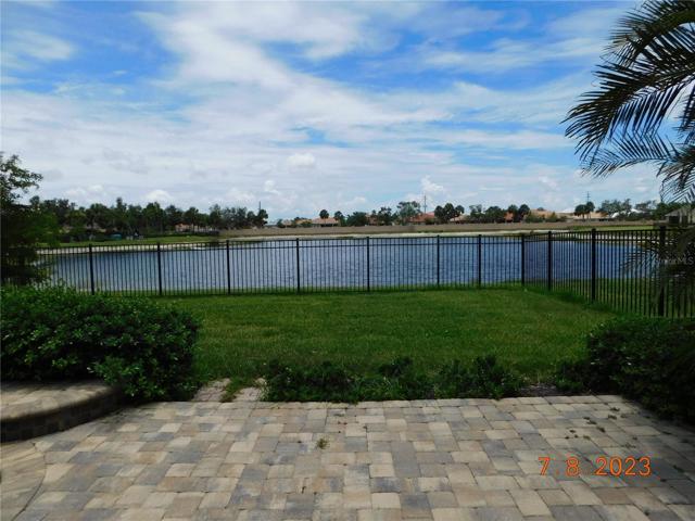 fabulous, fenced, lakefront backyard