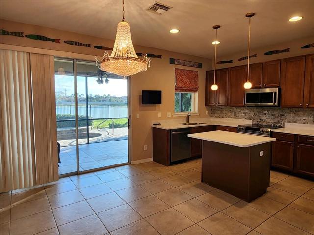 dining room & kitchen open to the lanai