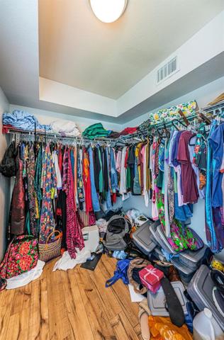 WALK-IN CLOSET is MASSIVE with Added Convenience of a Stackable Washer Dryer Inside