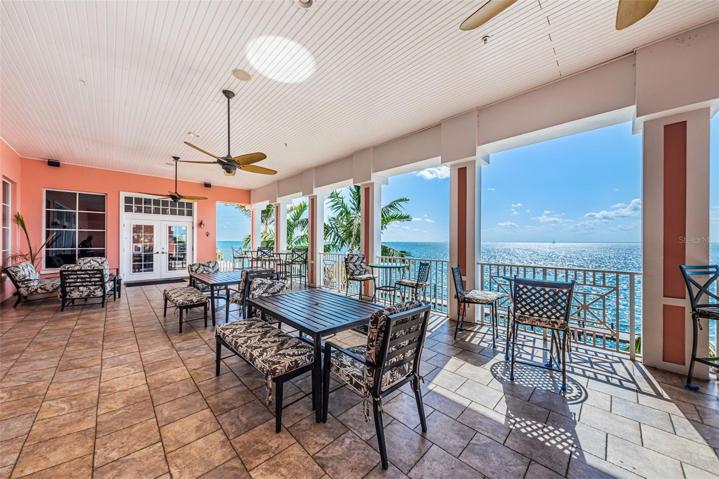 UPSTAIRS PATIO w/ FULL PRIVATE BAR Behind the White Door- Hosts Many Bar Games, Food & Drink Specials and Mixers to Meet Neighbors