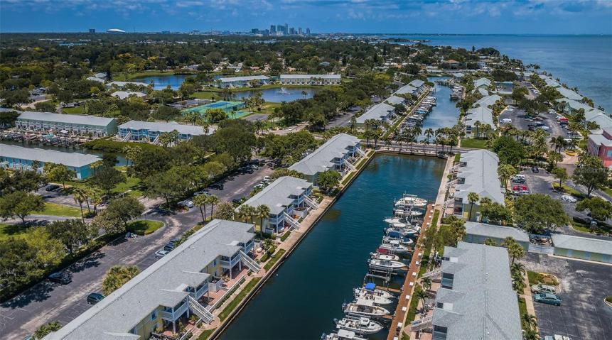 BEST LOCATION! You get the Beauty, Peace & Superb Fishing of WATERFRONT LIVING- 8 min away Experience the Lively Bars, Restaurants, Ray's and Rowdies Games, Museums, Galleries & Shopping DOWNTOWN- 20 min away from Award Winning GULF BEACHES=Warm Water, Powdery Sand, Excursions, Shopping, Bars & Restaurants- each Beach Town w/ it's Own Specialty