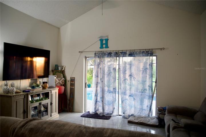 Living room with cathedral ceiling