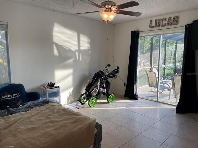 Guest bedroom with access to pool deck