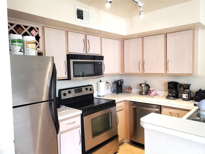 Kitchen; Track Lighting; Wine Rack above Refrigerator