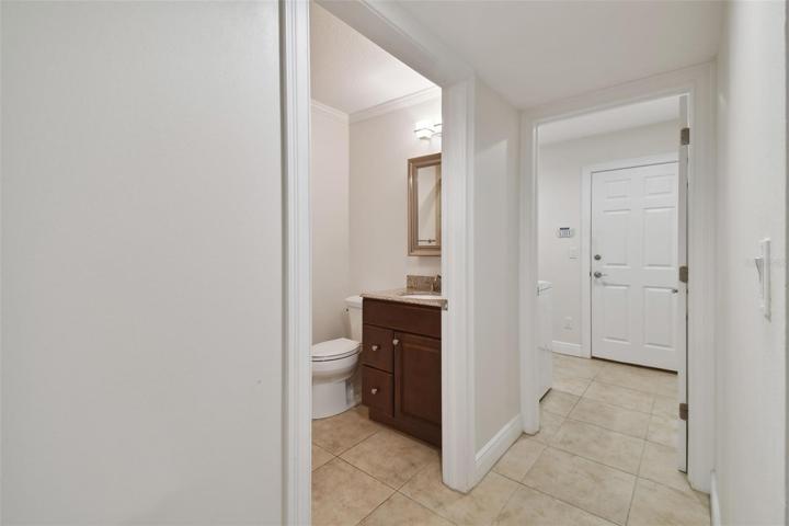 Hallway leading to garage