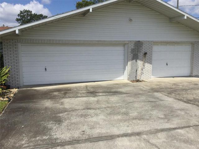 Three car garage and workroom