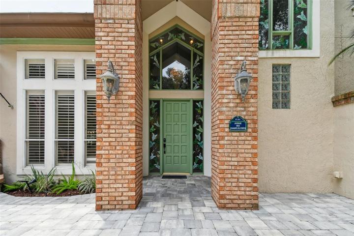 Front door with custom stained glass.