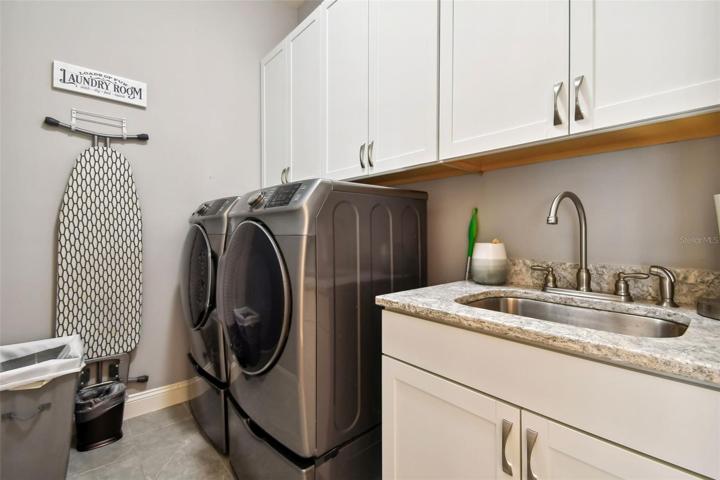 Laudry Room also has quartz countertops