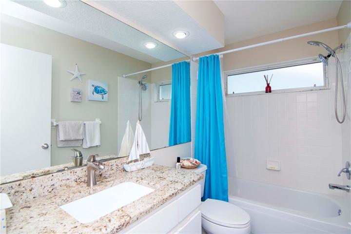 updated guest bathroom with shower/tub combo