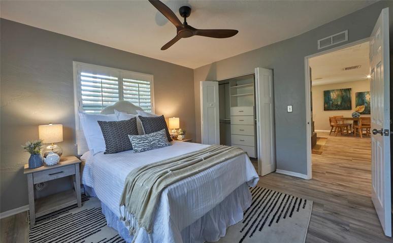 Bedroom 2 of the bedrooms on the right side of the house. All bedrooms have custom closet organizers, new ceiling fans, and plantation shutters.