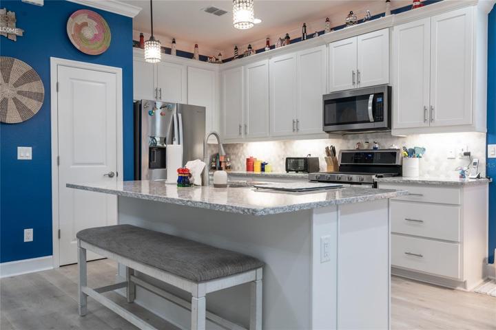 kitchen with large counter top.