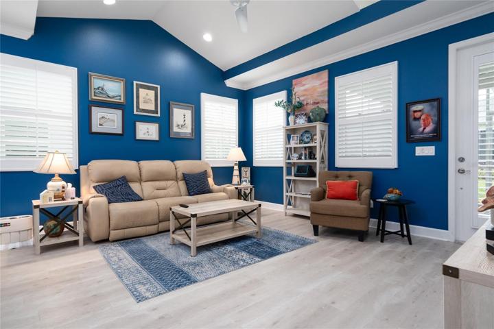 living room with cathedral ceilings.