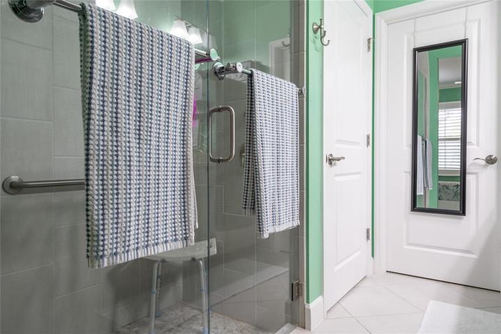 Walk in shower, and toilet area.