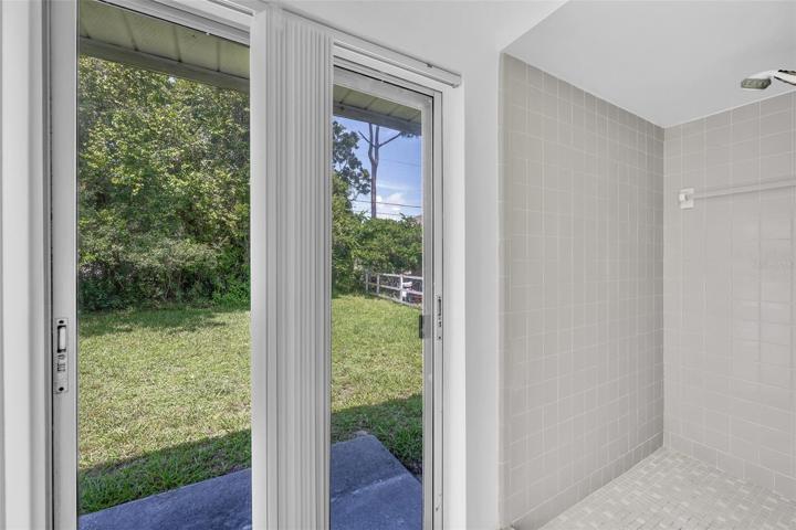 Primary Shower and Toilet Area