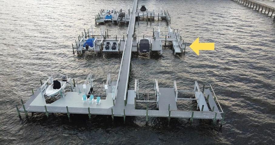 Deeded boat slip with 10,000 lb lift
