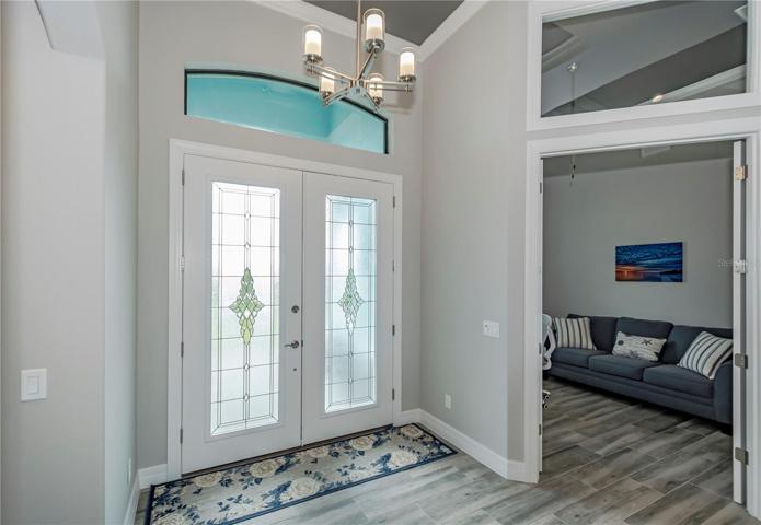 grand foyer with lots of natural light