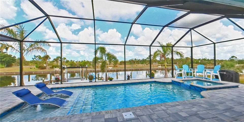 sun ledge pool with heated spa and lighting /bubbler package