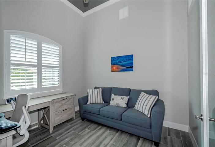 spacious office has sleeper sofa too