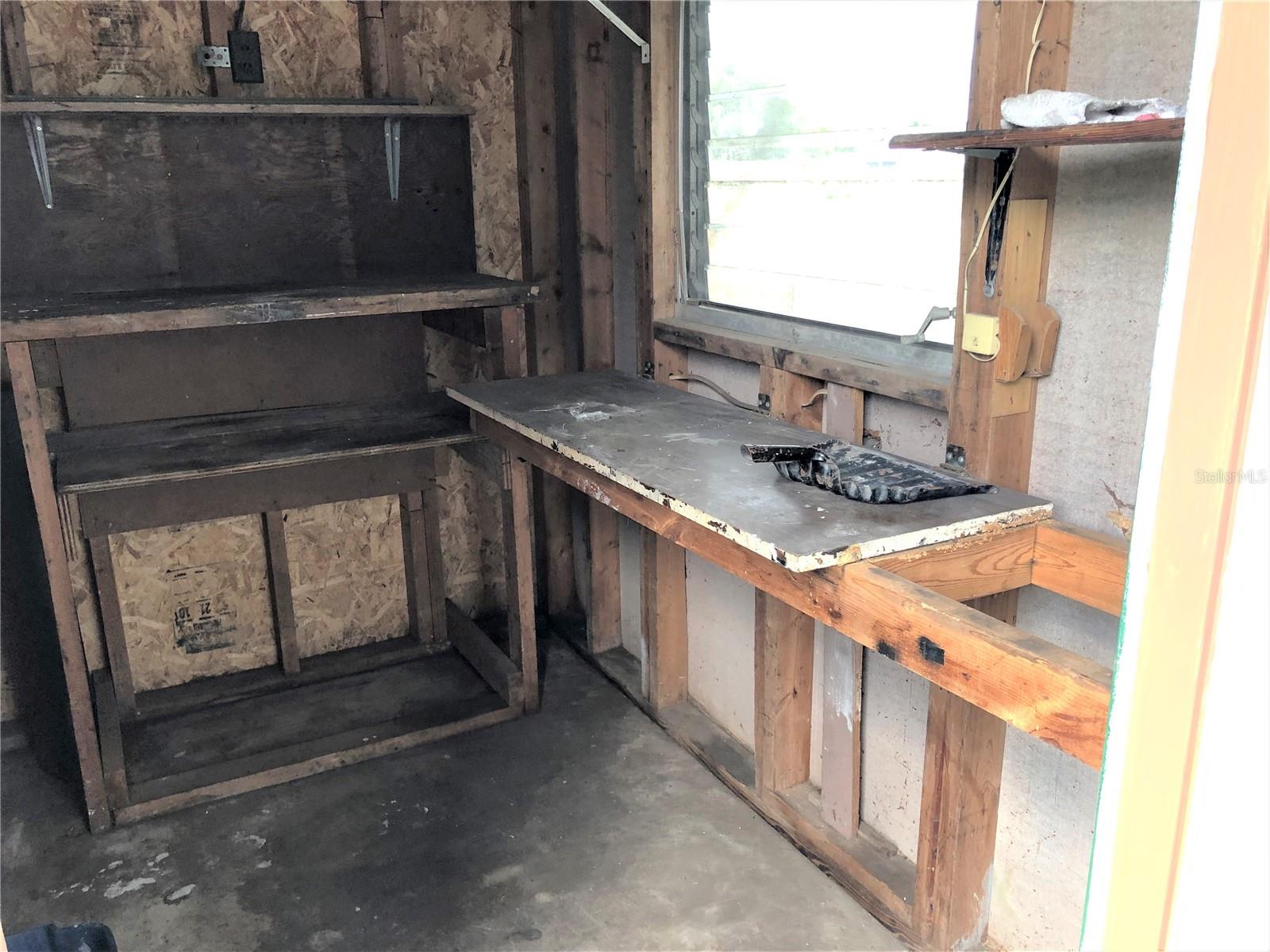 Storage room in carport