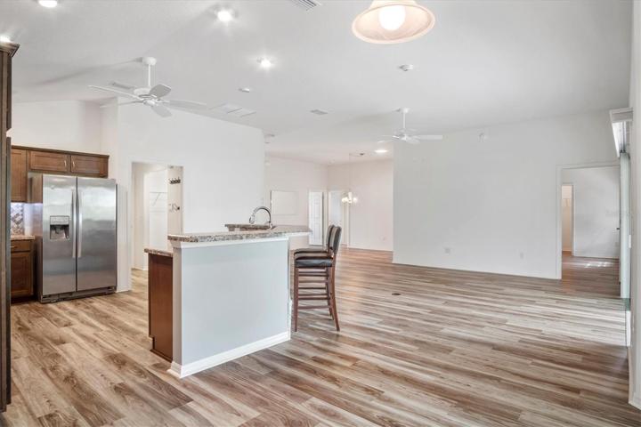 DINING NOOK AREA WITH LOTS OF GREAT WINDOWS
