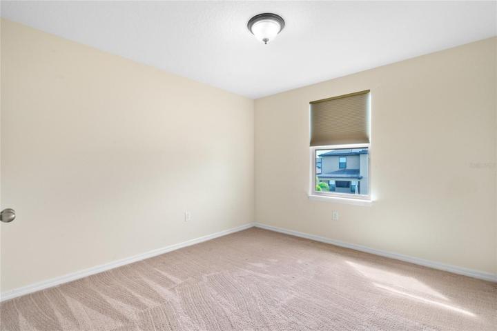 4th Bedroom with Levelor shades.