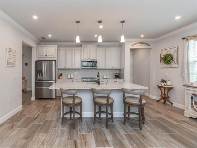 The breakfast bar is the perfect to enjoy a beverage while the chef prepares the special meal!