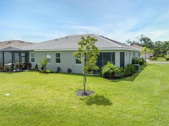 Perfectly situated and plenty of room for a game of corn hole with the family!
