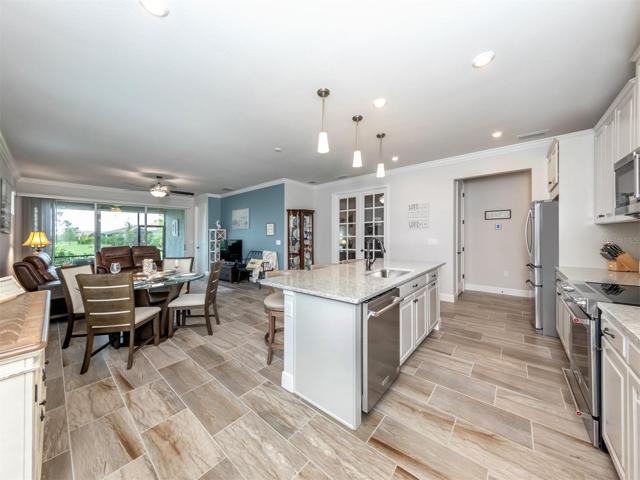 Step in side the will show piece with stunning tile flooring throughout the main living space!