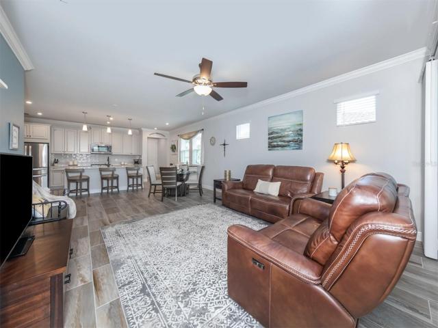 The large open concept design creates seamless living connecting the living, dining and kitchen!