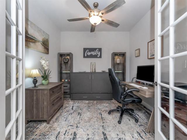 The den is spacious and offers dual glass doors so the room may also double as an additional guest quarters.