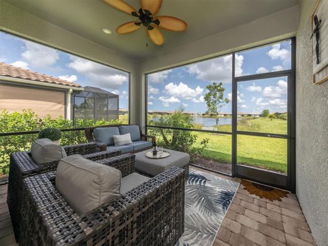 The screened lanai is inviting and the perfect location to wind down with a refreshing beverage after a day on the beach.