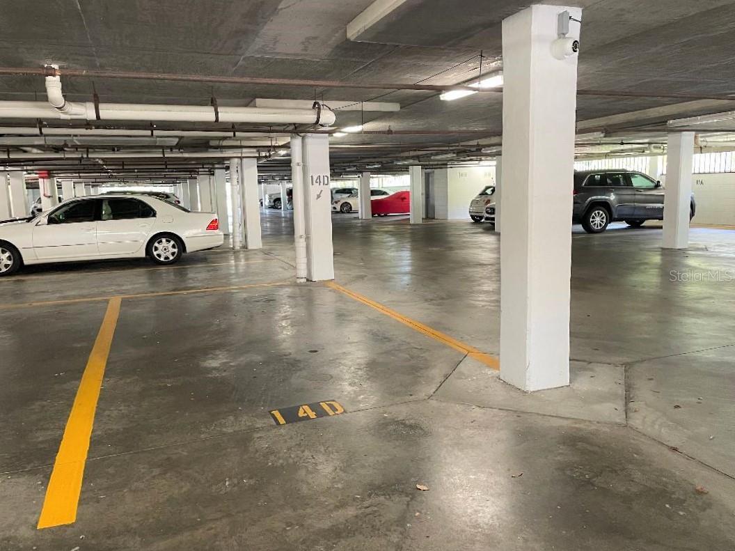 Your vehicle is secure in your assigned 14D end unit parking spot in the covered and gated private garage.