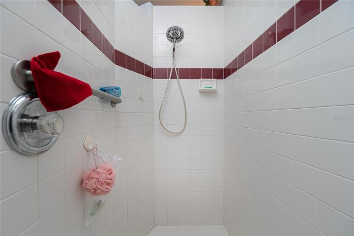Large, tiled walk in shower