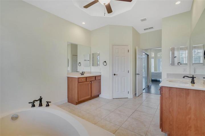 Dual vanities in master bathroom
