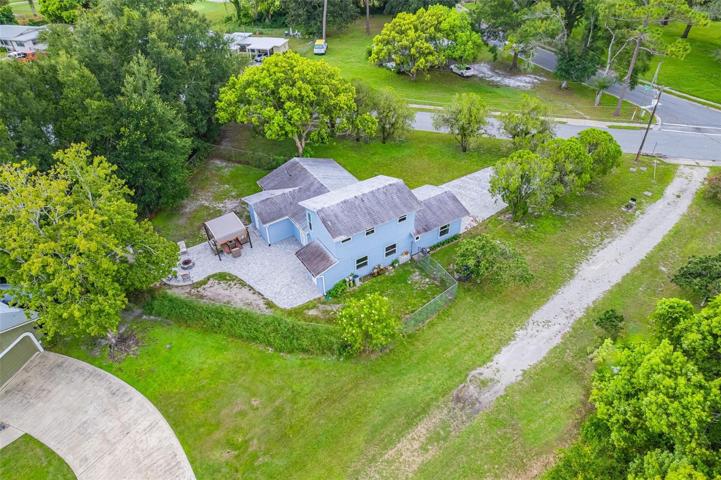 Aerial view of back and side of property