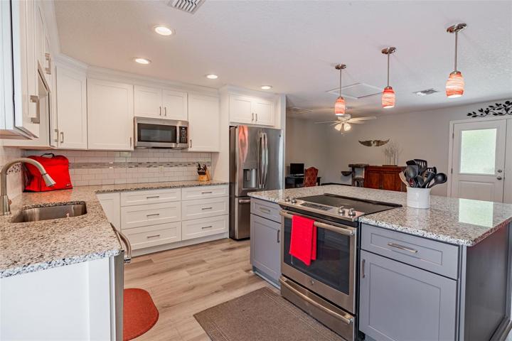 Stainless appliances and modern fixtures