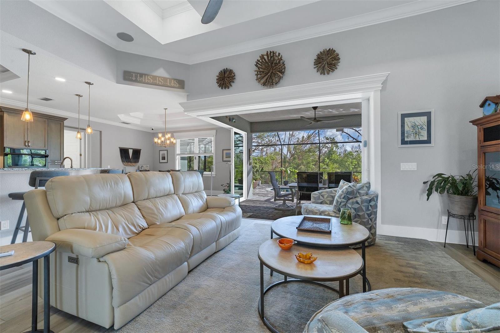 Disappearing 90-degree sliders bring the private outdoors inside.