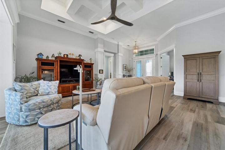 Large living room with area rug.
