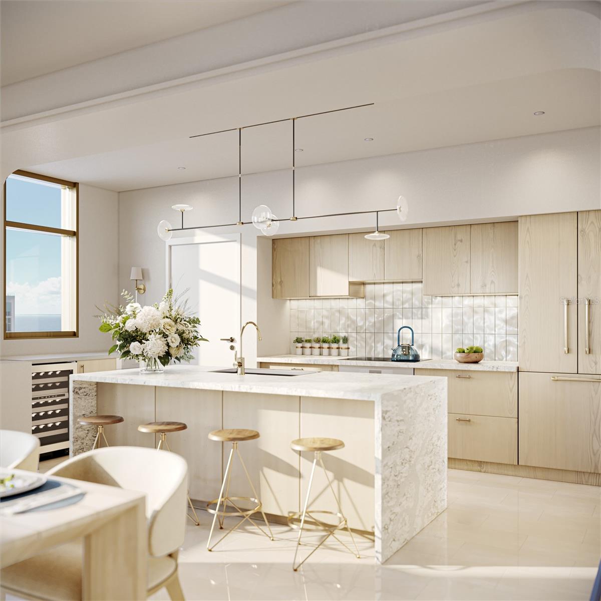 The elegantly designed kitchen includes Thermador appliances with a cabinet finish, quartz countertops with waterfall edge, wine/beverage bar. All included in the price