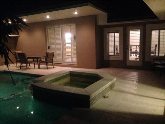 pool and deck by night