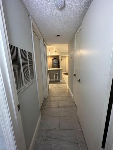 Hall to Bathroom and Bedroom 1
