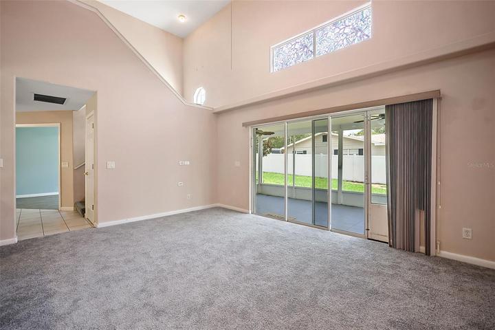 Family Room - on 1st Floor - has Sliders to Lanai.