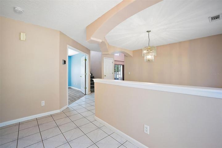 Foyer - there's also Storage under the Stairs leading to the 2nd Floor!