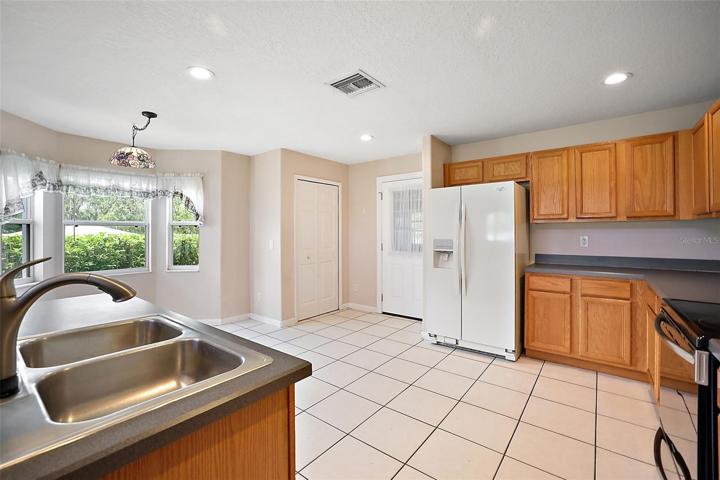 Kitchen Island has Sink & Dishwasher. There is also a Pantry next to the Kitchen Dining @ Bay Window.