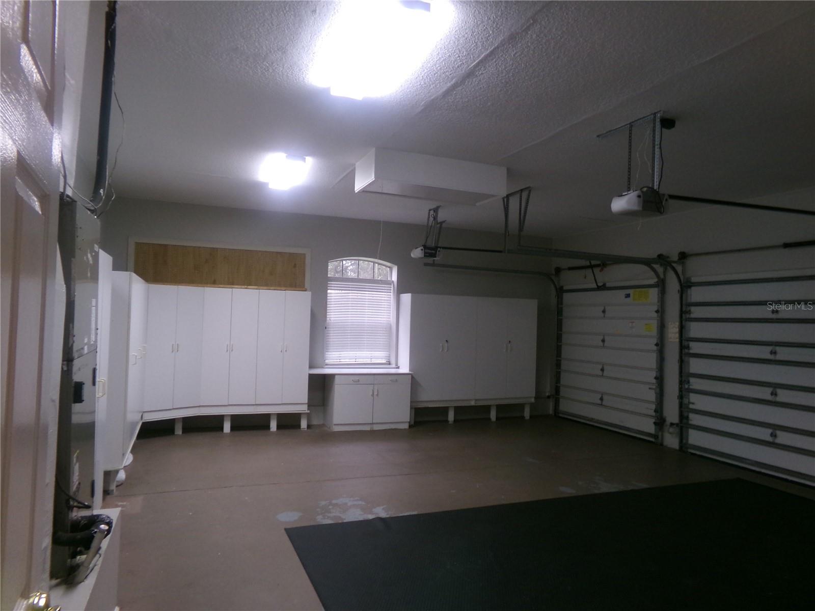 3 CAR GARAGE / STORAGE CABINETS