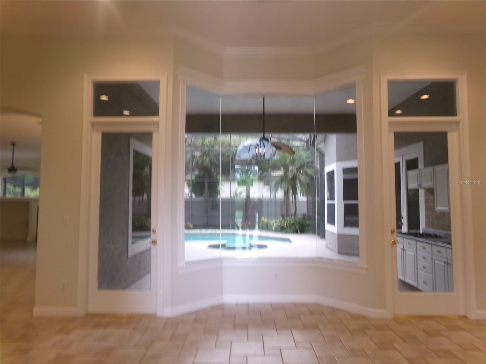 ENTRY WITH POOL VIEW